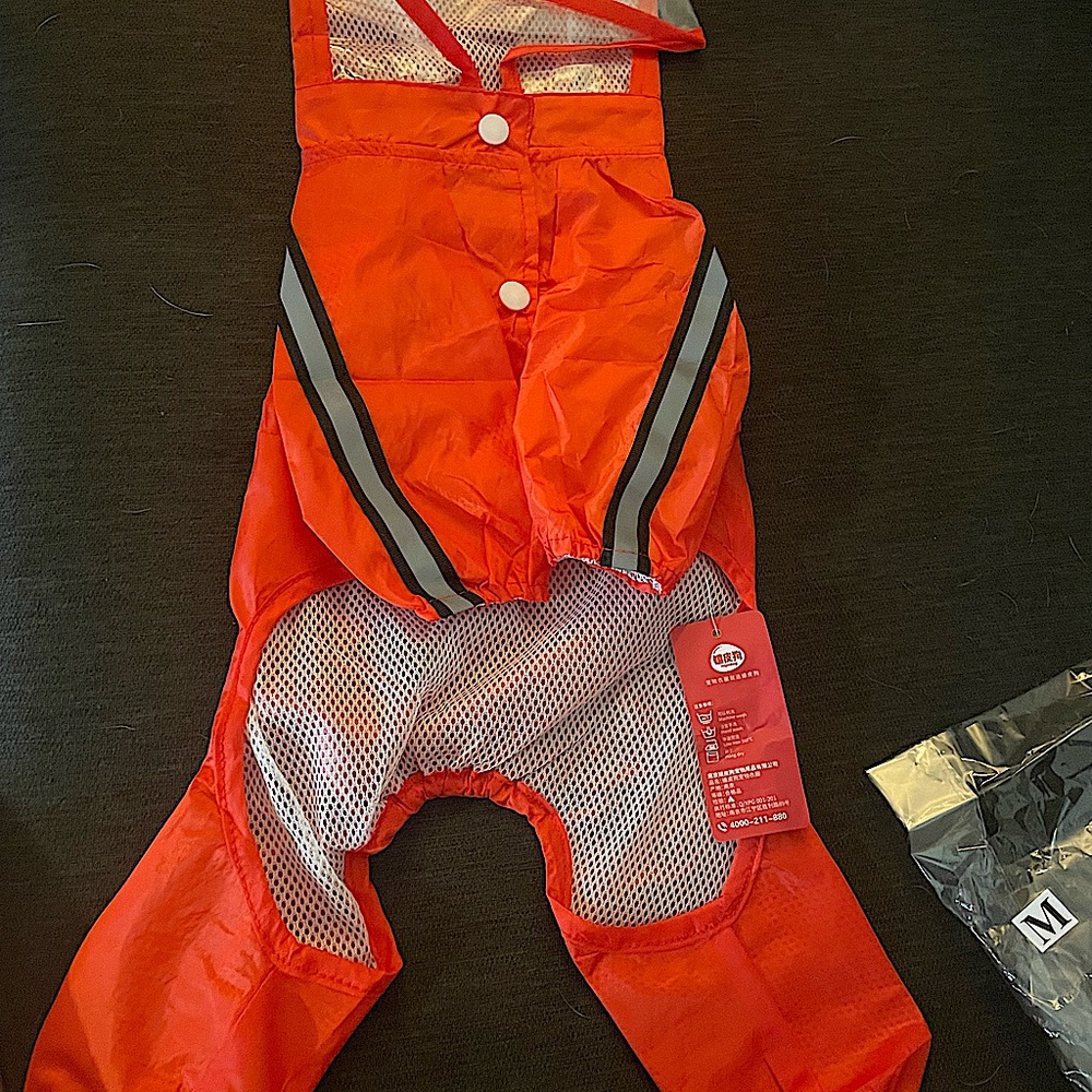 NWT Dog Raincoat with hood. Size Medium